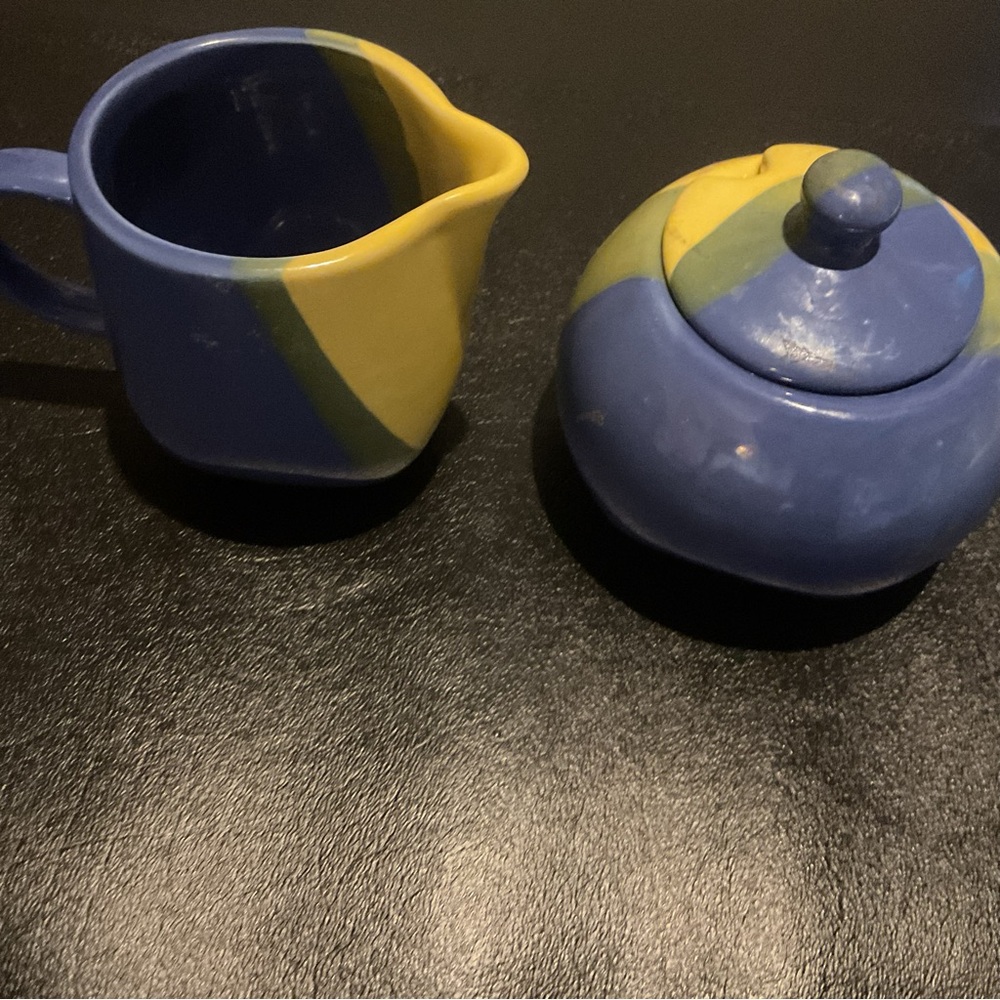 FESTIVE BLUE CANYON SUGAR BOWL AND CREAMER. GOOD CONDITION